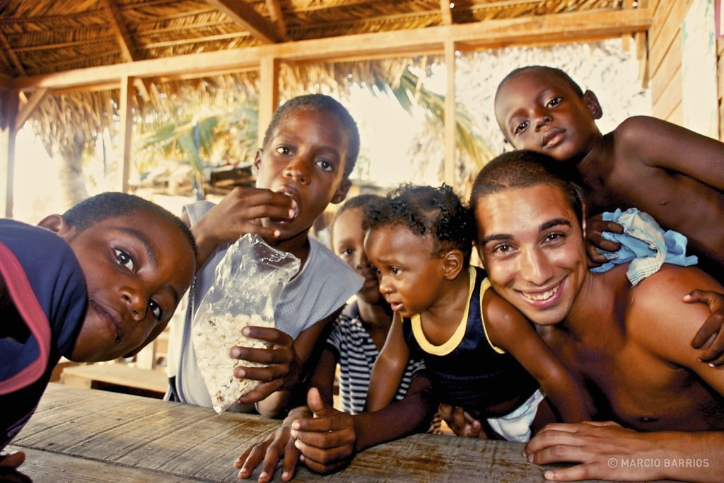 Playing with a group of Garifunas