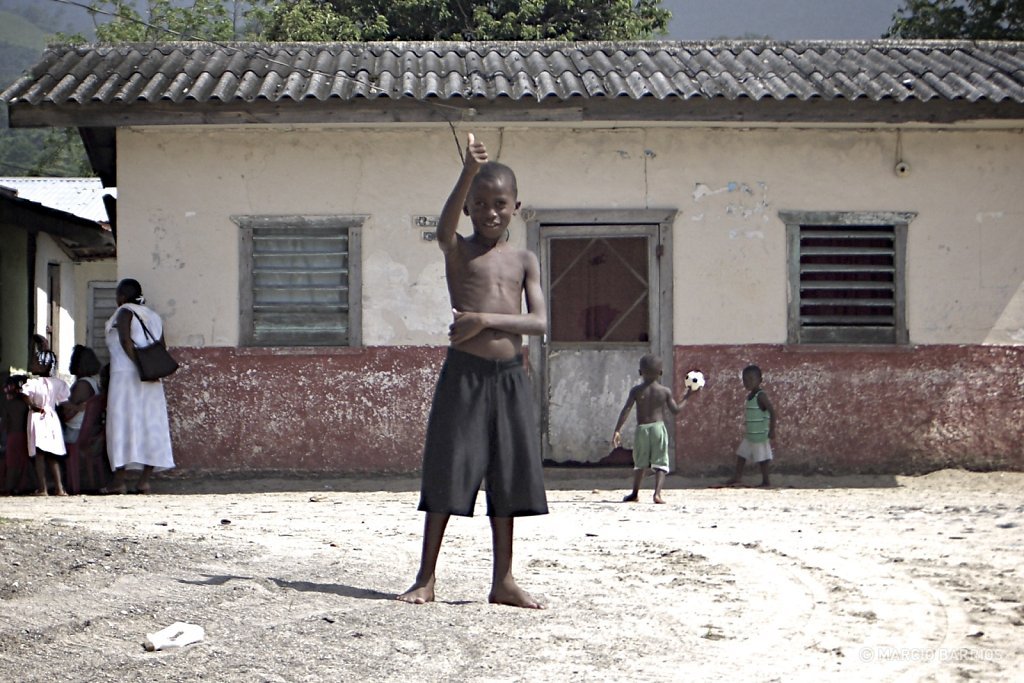 Corozal boy greeting