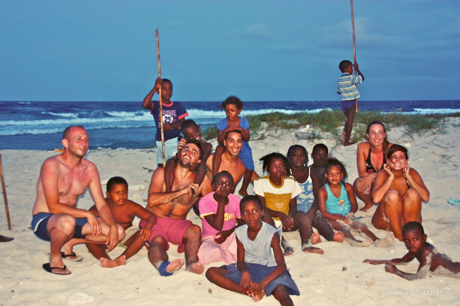 Playing with a group of Garifunas