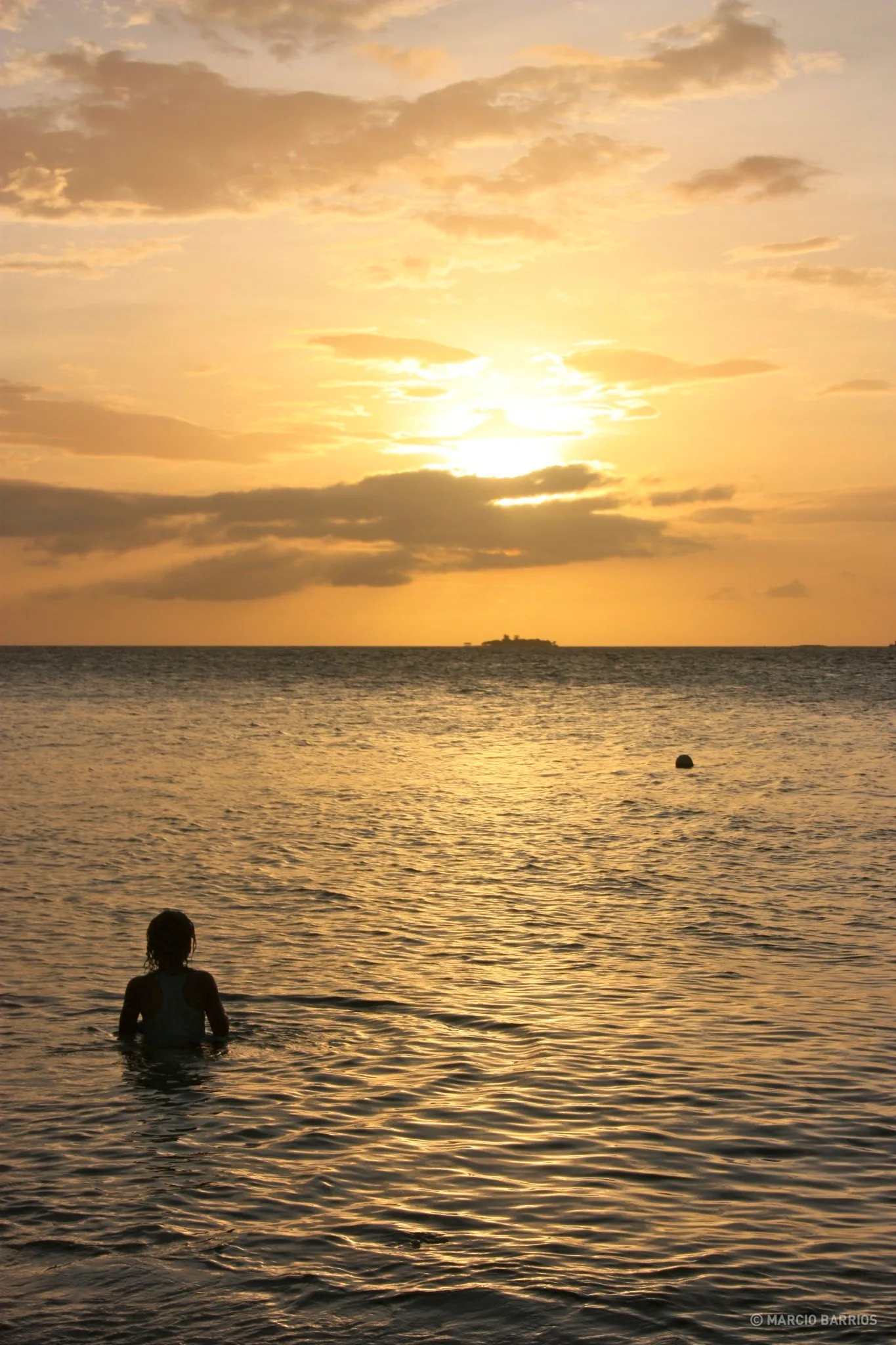 Garifuna boy enjoying the sunset in Chachauate